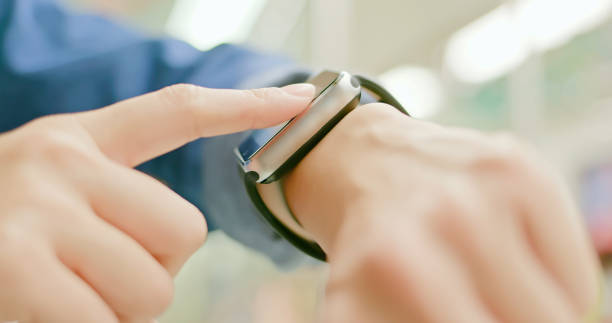 istock woman use wearable smart watch 1191386391