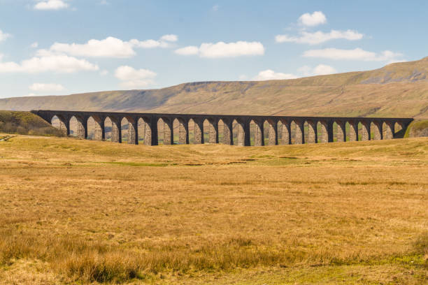 istock Viaduct with many arches in beautiful countryside. 1191387077
