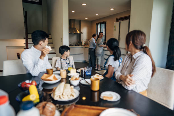 istock Family having breakfast together at home 1191389939