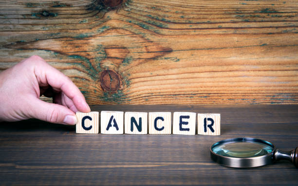 Cancer. Health, diagnosis, treatment and rehabilitation concept Cancer. Health, diagnosis, treatment and rehabilitation concept. Wooden letters on the office desk, information and communication background cancer screening stock pictures, royalty-free photos & images