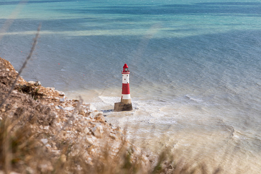 Beachy Head Lighthouse viewed from the chalk headlands in East Sussex, England called Beachy Head.