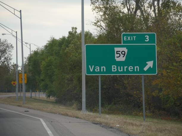 istock A directional sign along the road with exit directions to Van Buren, Arkansas. 1191393439
