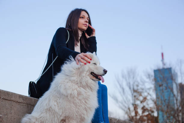 istock Girl with a dog 1191397944