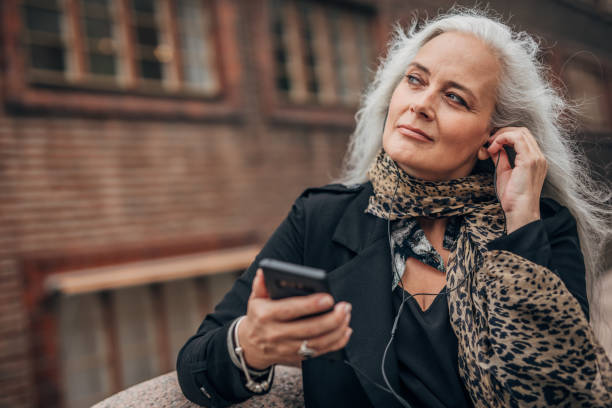 istock Mature lady on the street 1191399625