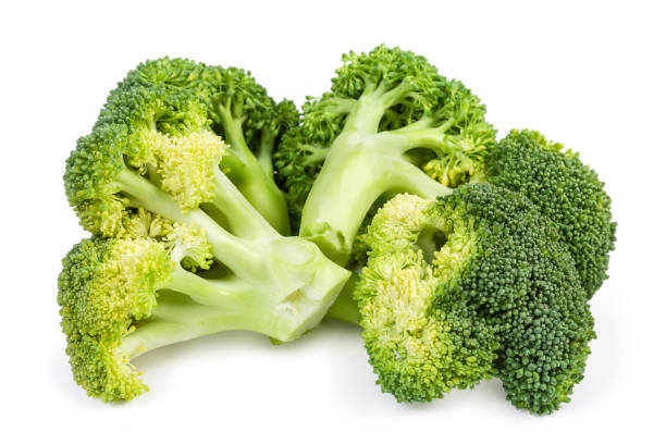 istock Branches of fresh broccoli on a white background close-up 1191399959