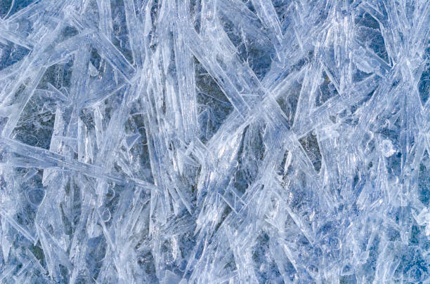 istock Ice texture with blue ice crystals. Winter and Christmas background 1191400028
