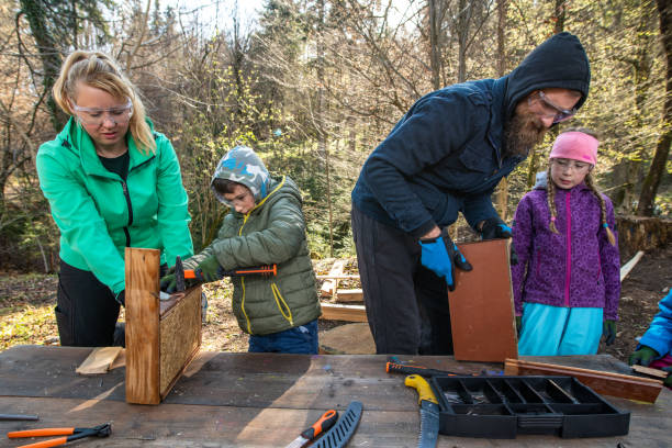 istock Teachers and students making a wooden box 1191402335