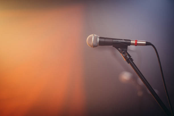 istock Close up of microphone on stage 1191408305
