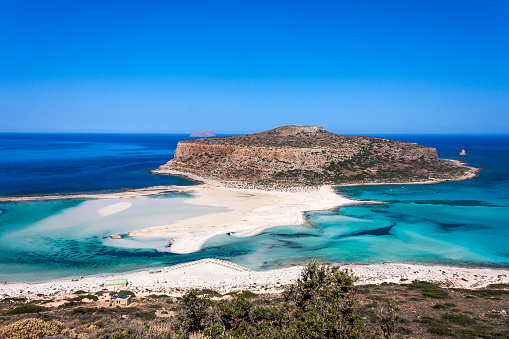the beautiful beach of Balos, opposite the island of Gramvousa, on the island of Crete. Crete is the largest and most populous of the Greek islands