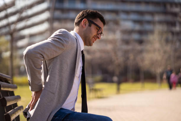 istock Businessman in park 1191409803