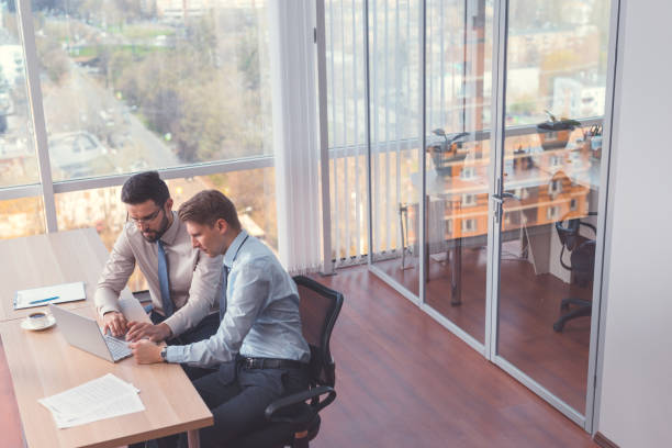 istock Smiling business people 1191410096