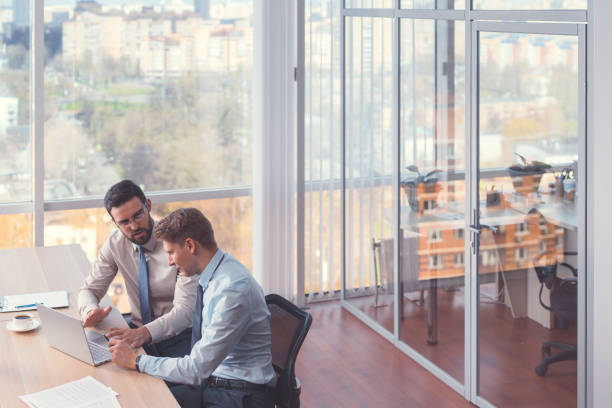 istock Young businessmen in the office 1191410242
