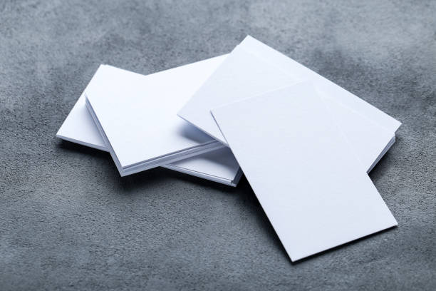 istock Blank business cards on gray background 1191411727