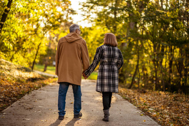 istock Senior couple in park 1191412811