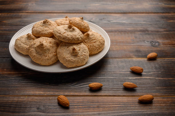 istock Almond biscuits on a plate on a wooden table 1191417417
