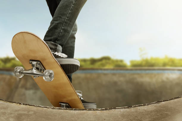 istock Skateboarder skateboarding at skate park 1191418392