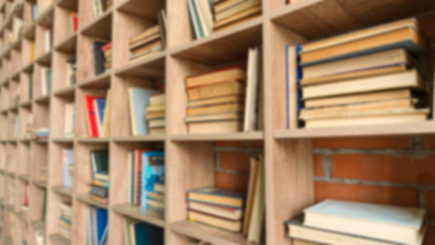 istock Book background. Blurred background with books on library shelves. 1191418464