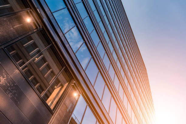 istock modern office building in sunny flash lens flare 1191419678
