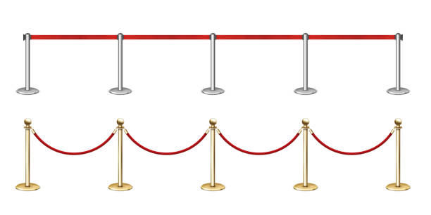 istock Golden rope barrier with red velvet rope fence. 1191423966