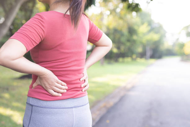 istock Women have backaches because of heavy lifting. 1191425268