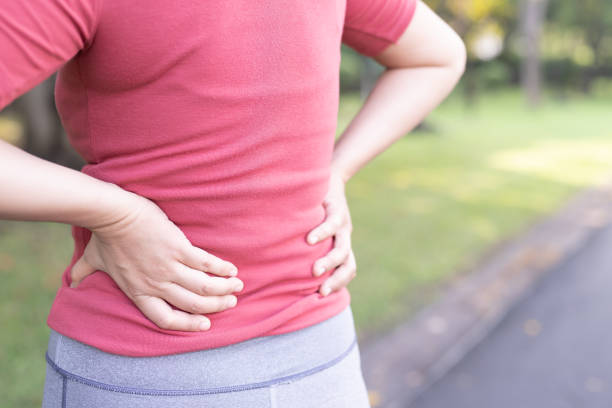 istock Women have backaches because of heavy lifting. 1191425343