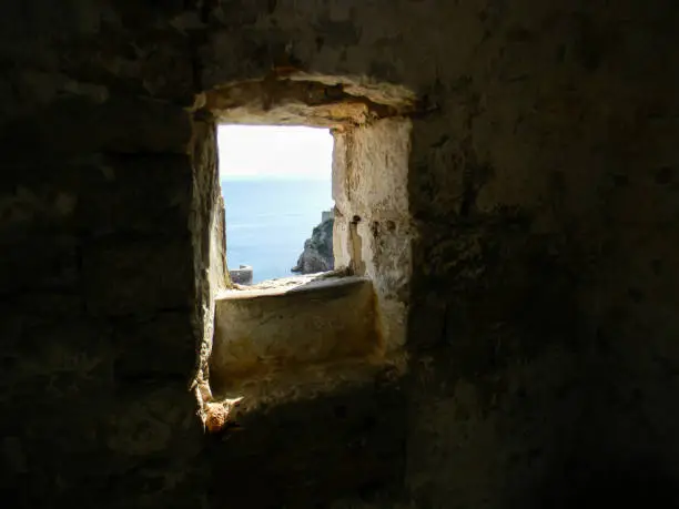 Photo of The window in basement room in ancient ruin, Croatia