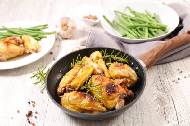 istock grilled chicken leg and green bean 1191426717
