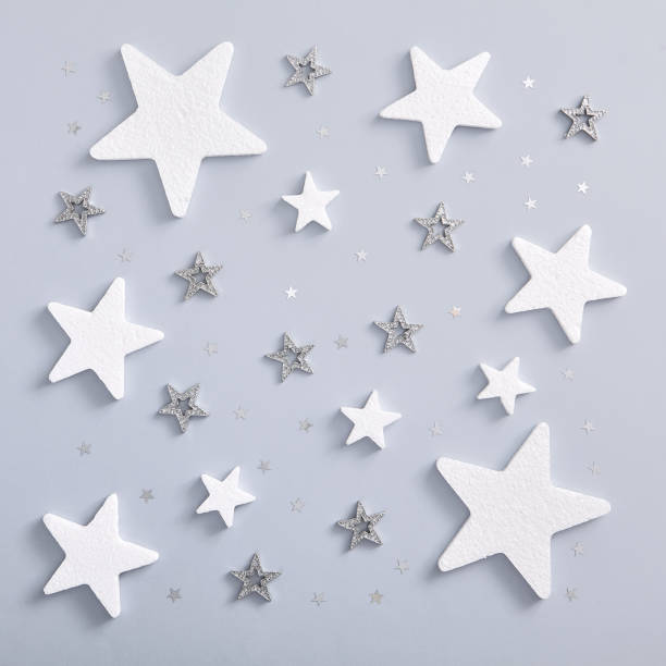 istock White and silver star over pastel blue background 1191427817