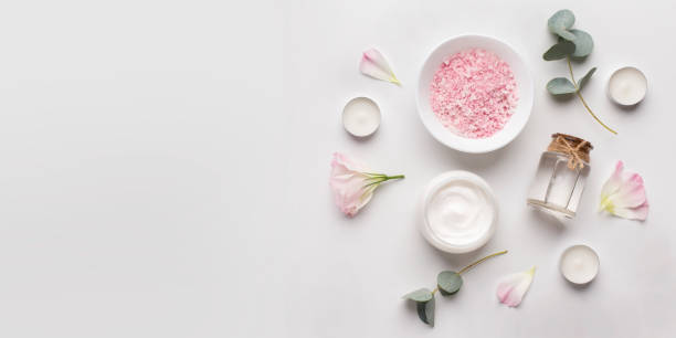 istock Aromatherapy with sea salt and natural cream on white 1191429822