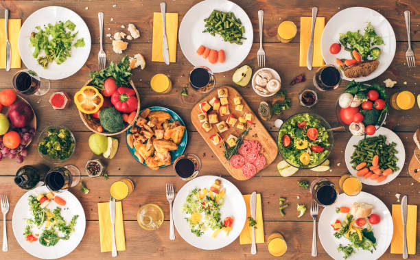 istock Table settings for family dining on wooden surface 1191429962