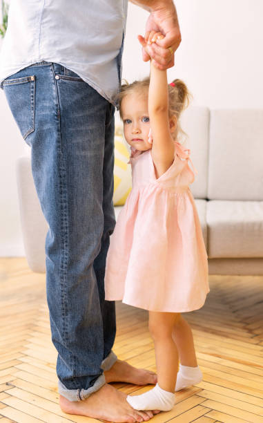 istock Millennial daddy dancing with his small child 1191431587