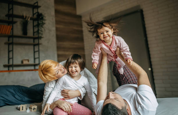 istock Family cuddling in bed 1191431628