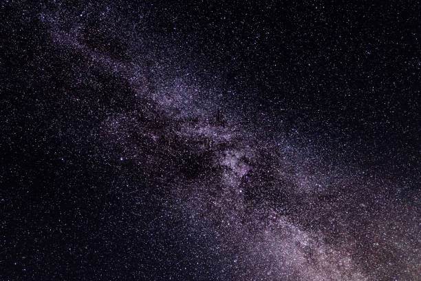 istock Night sky with stars and Milky Way galaxy in outer space, universe background 1191431649