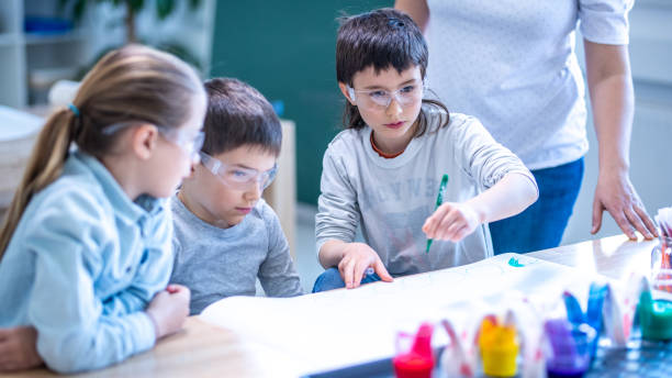 istock Students doing traveling water experiment in laboratory 1191433331