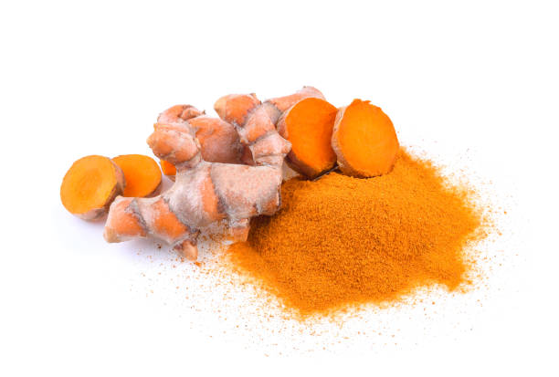 istock Turmeric roots and turmeric powder isolated on white background 1191434353