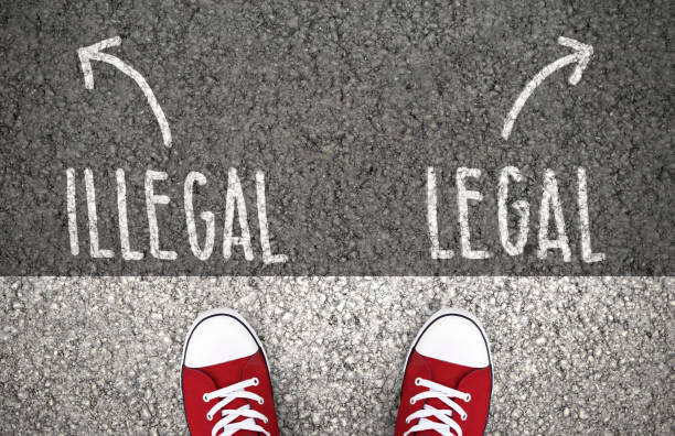 istock Legal or illegal decision at a crossroad 1191434354