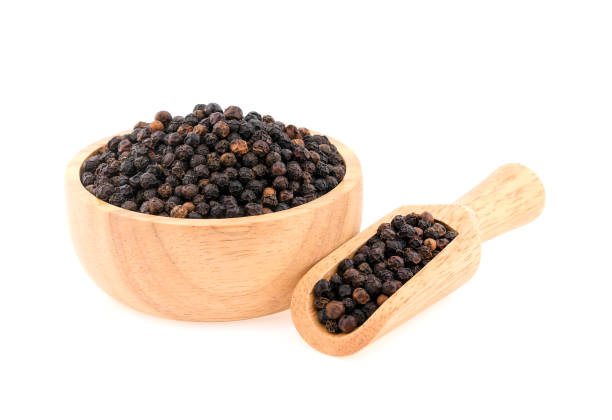 istock Black pepper corns isolated on white background 1191434393