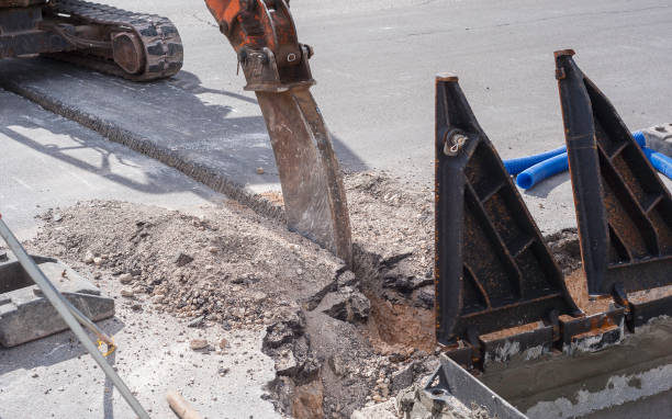 istock Worker movemen regulates the circulation of vehicles in an intersection affected by construction work on the fiber optic line 1191434456
