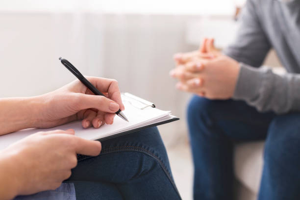 istock Therapist noting patient speech during personal session 1191437505