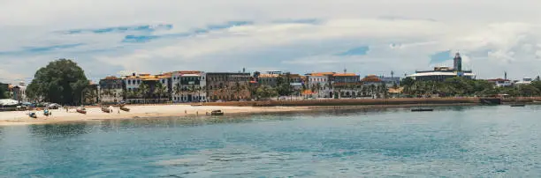 wide panoranic of Stonetown Zanzibar cityscape seen from the oceanside