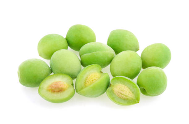 istock Green plum isolated on white background 1191442248