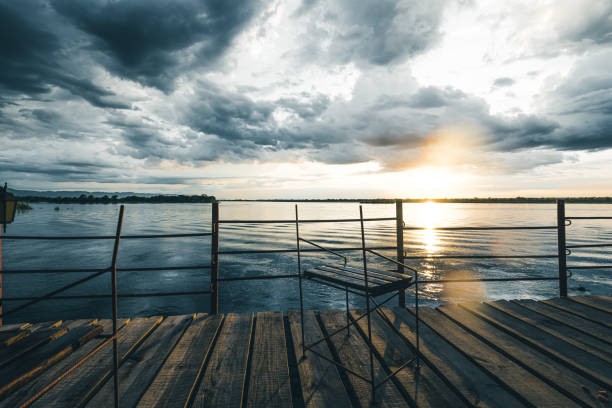 view from wooden terrace on Zambezi river at sunrise