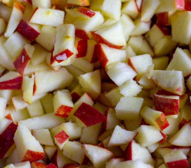 istock apple background is diced to add to the pies 1191444839