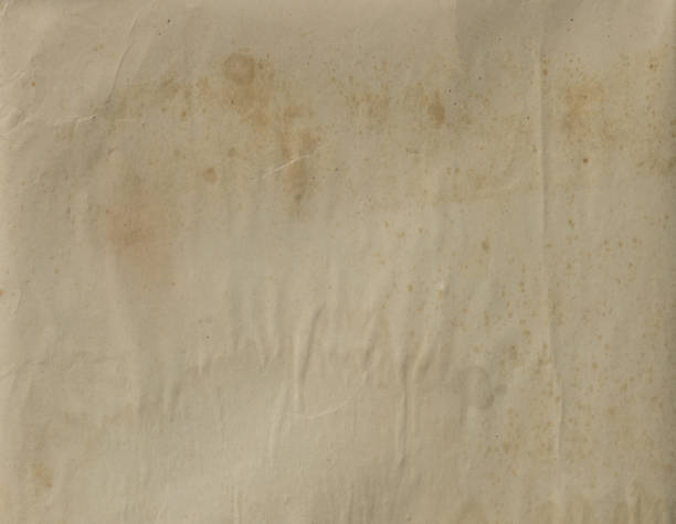 vintage texture of an empty old yellowed crumpled sheet of paper vintage texture of an empty old yellowed crumpled sheet of paper yellowed edges stock pictures, royalty-free photos & images