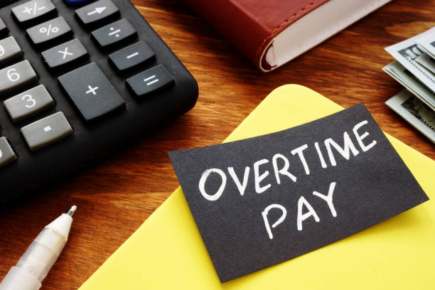 Text sign showing hand written words Overtime pay Text sign showing hand written words Overtime pay working late stock pictures, royalty-free photos & images