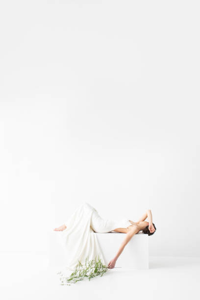 istock Woman in Wedding Dress Posing at Studio 1191456266
