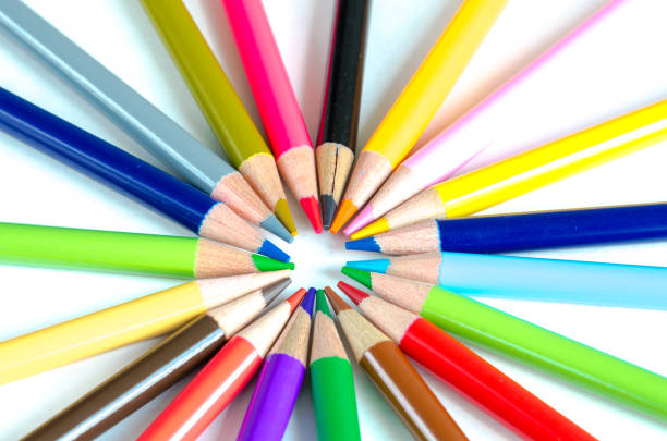 istock Various colorful pencils in circle pattern isolated on white 1191459321