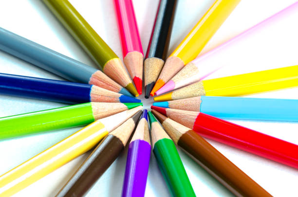 istock Various colorful pencils in circle pattern isolated on white 1191459424
