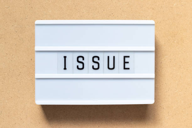 istock White lightbox with word issue on wood background 1191461378