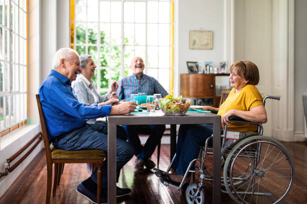 istock Elderly friends talking over lunch 1191468475